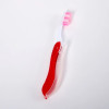 Travel folding toothbrush, red
